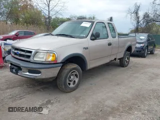 1997 Ford F-150 XL with VIN 1FTDX18W9VNC18055, listed as a IAAI auction lot 41982829 with 189,513 mi miles. Bid and sale history available at carsss.com. Image 2.