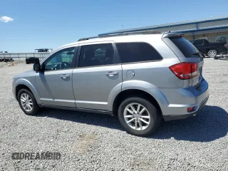 2017 Dodge Journey SXT with VIN 3C4PDDBG3HT591993, listed as a Copart auction lot 58241065 with 161,964 mi miles and Salvage title. Bid and sale history available at DreamBid. Image 2.