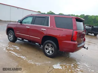2017 Chevrolet Tahoe LT with VIN 1GNSKBKCXHR270034, listed as a IAAI auction lot 42036132 with 144,530 mi miles. Bid and sale history available at carsss.com. Image 3.