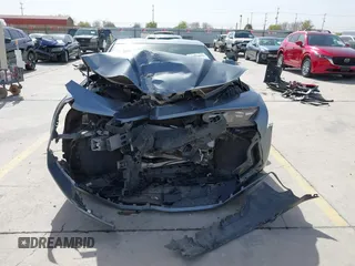 2021 Chevrolet Camaro 1LT z VIN 1G1FB1RX9M0125698, wystawiony jako IAAI lot #41824653 z przebiegiem 69 365 mil mil oraz . Historia ofert i sprzedaży dostępna na DreamBid. Obrazek 13.