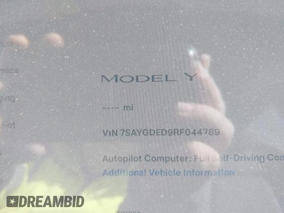2024 Tesla Model Y with VIN 7SAYGDED9RF044789, listed as a IAAI auction lot 41817318 with Not Provided miles and . Bid and sale history available at DreamBid. Image 15.