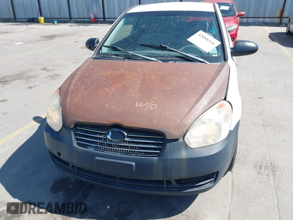 2008 Hyundai Accent GS with VIN KMHCM36CX8U073896, listed as a IAAI auction lot 42088516 with 182,092 mi miles. Bid and sale history available at carsss.com. Image 6.