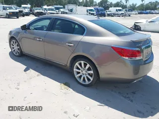 2011 Buick LaCrosse CXS with VIN 1G4GE5ED4BF365124, listed as a IAAI auction lot 42802593 with 149,820 mi miles and . Bid and sale history available at DreamBid. Image 3.