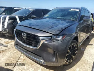 2024 Mazda CX-90 S Premium z VIN JM3KKDHC1R1124589, wystawiony jako Copart lot #76705984 z przebiegiem 6 916 mil mil oraz Nie do naprawy • Non repairable. Historia ofert i sprzedaży dostępna na DreamBid. Obrazek 1.