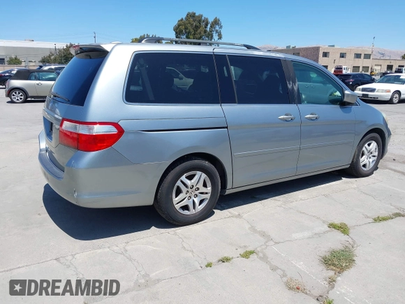 2006 Honda Odyssey EX-L z VIN 5FNRL38716B051664, wystawiony jako IAAI lot #42520320 z przebiegiem 304 835 mil mil oraz . Historia ofert i sprzedaży dostępna na DreamBid. Obrazek 4.