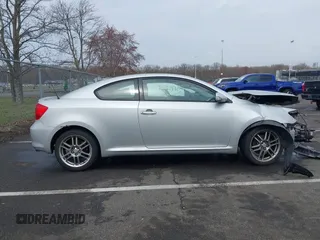 2005 Scion tC with VIN JTKDE177150001329, listed as a IAAI auction lot 41952901 with 143,223 mi miles. Bid and sale history available at carsss.com. Image 13.