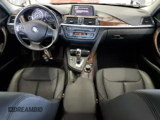 2014 BMW 3 Series 320i xDrive with VIN WBA3C3C53EF985375, listed as a Copart auction lot 62833435 with 75,726 mi miles and Salvage title. Bid and sale history available at DreamBid. Image 8.