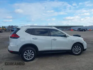 2017 Nissan Rogue S with VIN JN8AT2MVXHW017964, listed as a IAAI auction lot 41869965 with 123,544 mi miles and . Bid and sale history available at DreamBid. Image 14.