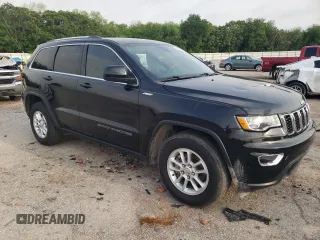 2018 Jeep Grand Cherokee Laredo E with VIN 1C4RJEAG2JC353823, listed as a Copart auction lot 54419545 with 116,770 mi miles and Salvage title. Bid and sale history available at DreamBid. Image 4.