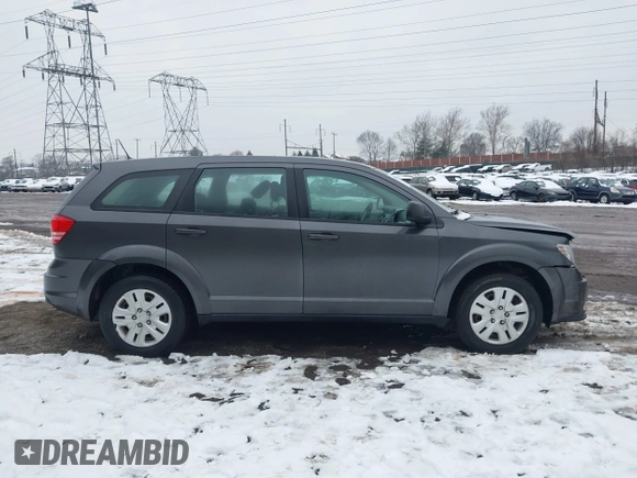 2014 Dodge Journey SE with VIN 3C4PDCAB0ET182376, listed as a IAAI auction lot 41569006 with 106,024 mi miles and . Bid and sale history available at DreamBid. Image 13.