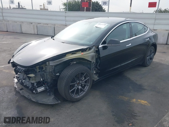 2020 Tesla Model 3 Long Range z VIN 5YJ3E1EB0LF600098, wystawiony jako IAAI lot #41071258 z przebiegiem 149 939 mil mil oraz . Historia ofert i sprzedaży dostępna na DreamBid. Obrazek 22.