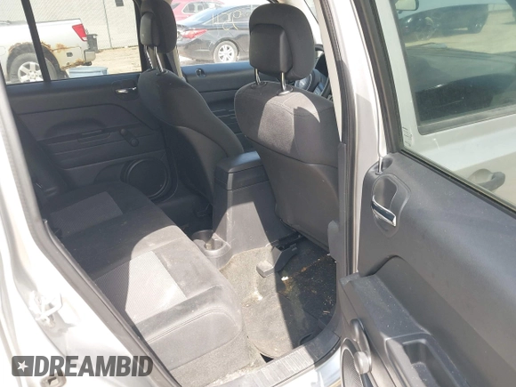 2013 Jeep Patriot Sport with VIN 1C4NJPBAXDD254864, listed as a IAAI auction lot 42019511 with 139,994 mi miles. Bid and sale history available at carsss.com. Image 8.
