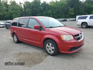 2012 Dodge Grand Caravan SXT with VIN 2C4RDGCG3CR236407, listed as a Copart auction lot 54771015 with 184,859 mi miles and Clean Title. Bid and sale history available at DreamBid. Image 4.