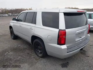 2018 Chevrolet Tahoe Commercial with VIN 1GNLCDEC0JR276911, listed as a IAAI auction lot 40809423 with 110,163 mi miles. Bid and sale history available at carsss.com. Image 3.