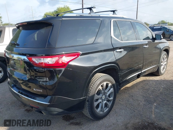 2018 Chevrolet Traverse Premier with VIN 1GNERKKW3JJ157873, listed as a IAAI auction lot 42448292 with 78,077 mi miles and . Bid and sale history available at DreamBid. Image 4.