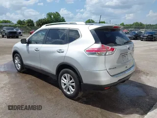 2015 Nissan Rogue S with VIN KNMAT2MT1FP502091, listed as a IAAI auction lot 41940559 with 360,915 mi miles and . Bid and sale history available at DreamBid. Image 3.