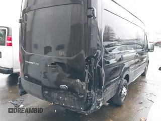 2022 Ford Transit Cargo z VIN 1FTBR3U85NKA64644, wystawiony jako IAAI lot #41006811 z przebiegiem 101 658 mil mil oraz . Historia ofert i sprzedaży dostępna na DreamBid. Obrazek 6.