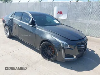 2015 Cadillac CTS Premium RWD z VIN 1G6AT5S33F0128454, wystawiony jako IAAI lot #42455092 z przebiegiem 163 216 mil mil oraz . Historia ofert i sprzedaży dostępna na DreamBid. Obrazek 1.