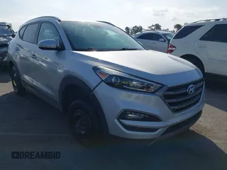2016 Hyundai Tucson Sport with VIN KM8J33A20GU165154, listed as a IAAI auction lot 41611785 with Not Provided miles. Bid and sale history available at carsss.com. Image 1.
