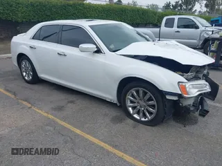 2012 Chrysler 300 C z VIN 2C3CCAET4CH236569, wystawiony jako IAAI lot #42181321 z przebiegiem 144 243 mil mil oraz . Historia ofert i sprzedaży dostępna na DreamBid. Obrazek 1.