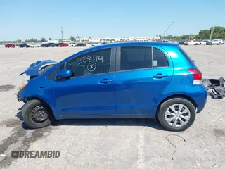 2009 Toyota Yaris with VIN JTDKT903X95257701, listed as a IAAI auction lot 41796420 with 86,953 mi miles. Bid and sale history available at carsss.com. Image 15.