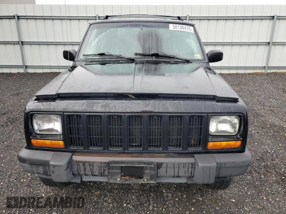 1999 Jeep Cherokee Sport with VIN 1J4FF68S8XL671341, listed as a Copart auction lot 58136475 with 139,848 mi miles and Salvage title. Bid and sale history available at DreamBid. Image 5.