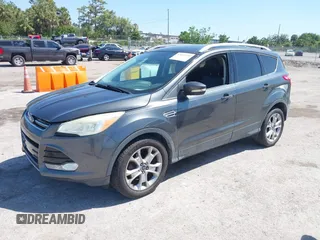 2016 Ford Escape Titanium with VIN 1FMCU0J95GUB11995, listed as a IAAI auction lot 42065255 with 142,390 mi miles. Bid and sale history available at carsss.com. Image 17.