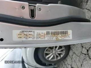 2014 Dodge Journey SXT z VIN 3C4PDCBB9ET161301, wystawiony jako Copart lot #46789575 z przebiegiem 112 662 mil mil oraz Szkoda całkowita • Salvage title. Historia ofert i sprzedaży dostępna na DreamBid. Obrazek 13.