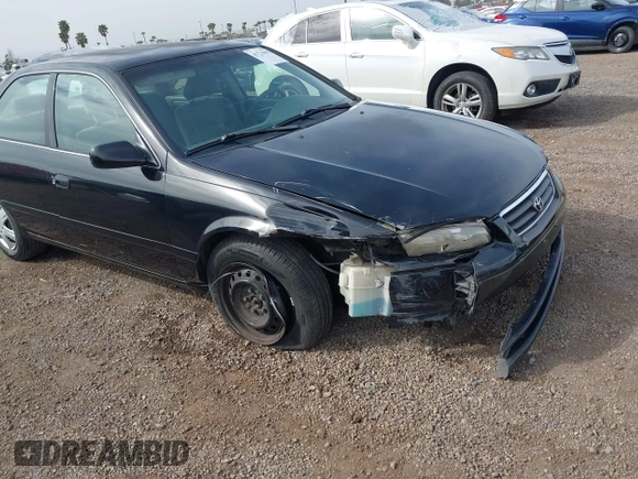 2001 Toyota Camry CE with VIN JT2BG22K910548345, listed as a IAAI auction lot 41723835 with 170,228 mi miles and . Bid and sale history available at DreamBid. Image 6.
