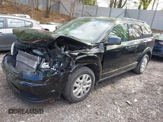 2017 Dodge Journey SE z VIN 3C4PDCAB6HT697631, wystawiony jako IAAI lot #42200146 z przebiegiem 158 511 mil mil oraz . Historia ofert i sprzedaży dostępna na DreamBid. Obrazek 17.