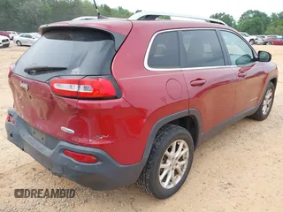 2016 Jeep Cherokee 75th Anniversary with VIN 1C4PJLCB6GW287894, listed as a IAAI auction lot 42435662 with 114,649 mi miles and . Bid and sale history available at DreamBid. Image 4.