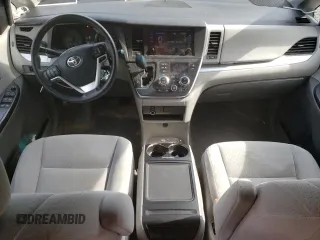 2016 Toyota Sienna LE AAS с VIN 5TDKK3DCXGS748822, выставлен на аукционе Copart как лот 56615505 с пробегом 128 191 миль миль и Списание • Salvage title. История ставок и продаж доступна на DreamBid. Изображение 8.