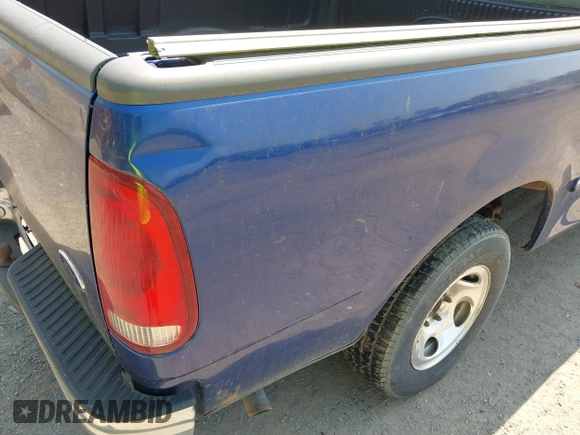 1998 Ford F-150 z VIN 2FTZX1727WCA55840, wystawiony jako IAAI lot #42437567 z przebiegiem 173 975 mil mil oraz . Historia ofert i sprzedaży dostępna na DreamBid. Obrazek 6.
