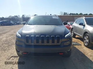2014 Jeep Cherokee Trailhawk with VIN 1C4PJMBS6EW278987, listed as a IAAI auction lot 41789868 with 136,696 mi miles. Bid and sale history available at carsss.com. Image 13.