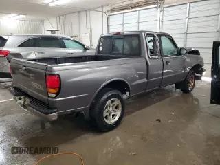 2000 Mazda B-Series 2WD Truck SE with VIN 4F4YR16V8YTM12086, listed as a Copart auction lot 82609244 with 297,354 mi miles and Salvage Title. Bid and sale history available at carsss.com. Image 3.