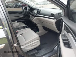 2018 Honda Odyssey EX-L with VIN 5FNRL6H72JB076597, listed as a IAAI auction lot 41838664 with 154,647 mi miles and . Bid and sale history available at DreamBid. Image 5.