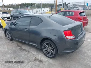 2013 Scion tC with VIN JTKJF5C74D3052964, listed as a IAAI auction lot 41804627 with 244,013 mi miles. Bid and sale history available at carsss.com. Image 3.