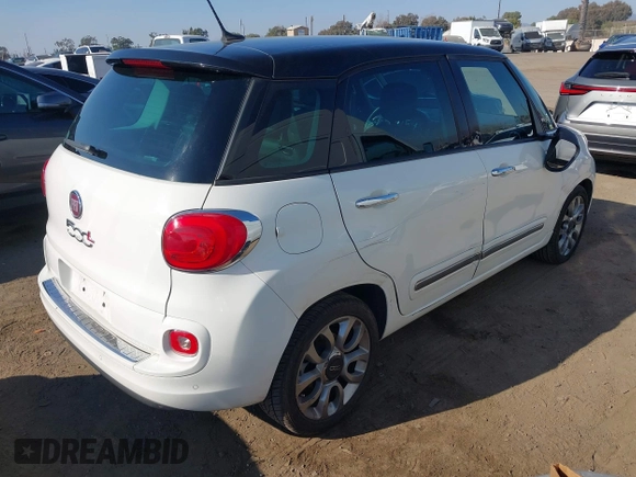 2014 FIAT 500L Lounge with VIN ZFBCFACH9EZ004041, listed as a IAAI auction lot 41366234 with 106,769 mi miles and . Bid and sale history available at DreamBid. Image 4.