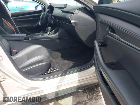 2024 Mazda 3 S Select Sport with VIN 3MZBPABMXRM427929, listed as a IAAI auction lot 42593321 with 20,378 mi miles and . Bid and sale history available at DreamBid. Image 5.