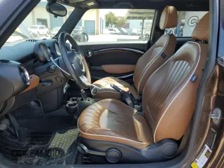 2010 MINI Hardtop with VIN WMWMF3C52ATZ62824, listed as a Copart auction lot 55175395 with 110,585 mi miles and Salvage Title. Bid and sale history available at DreamBid. Image 7.