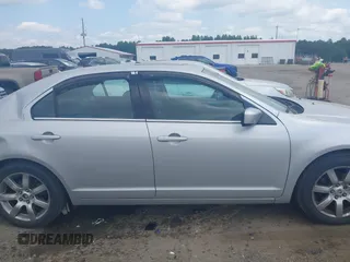 2010 Mercury Milan Premier z VIN 3MEHM0JG6AR648087, wystawiony jako IAAI lot #42483325 z przebiegiem 202 019 mil mil oraz . Historia ofert i sprzedaży dostępna na DreamBid. Obrazek 13.