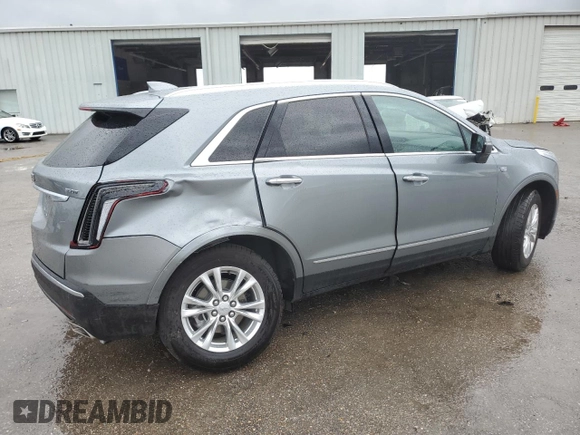 2023 Cadillac XT5 FWD Luxury z VIN 1GYKNAR47PZ144988, wystawiony jako Copart lot #50830365 z przebiegiem 17 687 mil mil oraz Szkoda całkowita • Salvage title. Historia ofert i sprzedaży dostępna na DreamBid. Obrazek 3.