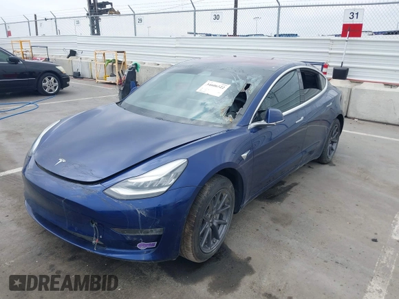 2018 Tesla Model 3 Long Range Battery with VIN 5YJ3E1EA1JF160350, listed as a IAAI auction lot 34606522 with 89,431 mi miles and . Bid and sale history available at DreamBid. Image 6.