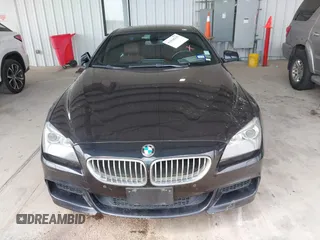 2012 BMW 6 Series 650i z VIN WBALX3C51CDV77602, wystawiony jako IAAI lot #41668235 z przebiegiem 103 684 mil mil oraz . Historia ofert i sprzedaży dostępna na DreamBid. Obrazek 12.