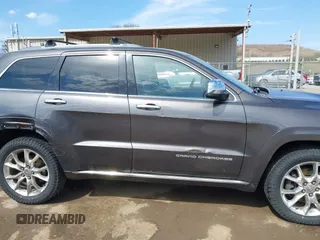 2014 Jeep Grand Cherokee Summit with VIN 1C4RJFJM5EC377129, listed as a IAAI auction lot 41763932 with 187,561 mi miles and . Bid and sale history available at DreamBid. Image 13.