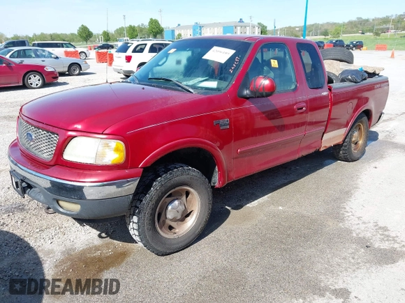 2001 Ford F-150 XL with VIN 1FTRX18L91NB88500, listed as a IAAI auction lot 42096189 with Not provided miles and . Bid and sale history available at DreamBid. Image 2.