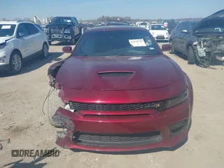 2022 Dodge Charger Scat Pack with VIN 2C3CDXGJ6NH216788, listed as a IAAI auction lot 41670744 with 48,680 mi miles and . Bid and sale history available at carsss.com. Image 12.