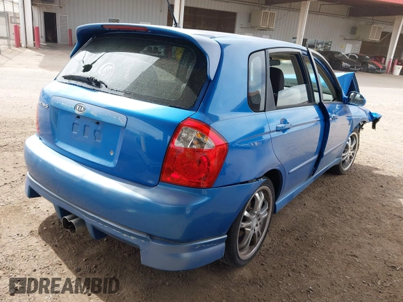 2005 Kia Spectra with VIN KNAFE161655095608, listed as a IAAI auction lot 41990765 with 51,415 mi miles. Bid and sale history available at carsss.com. Image 4.