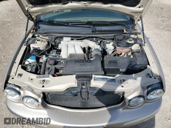 2004 Jaguar X-Type with VIN SAJEA51C64WD66013, listed as a Copart auction lot 50635615 with 47,365 mi miles and Salvage Title. Bid and sale history available at carsss.com. Image 11.