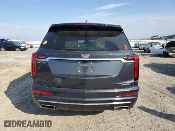 2021 Cadillac XT6 Premium Luxury z VIN 1GYKPCRS6MZ205831, wystawiony jako Copart lot #47259215 z przebiegiem 31 959 mil mil oraz Szkody całkowita. Historia ofert i sprzedaży dostępna na DreamBid. Obrazek 6.